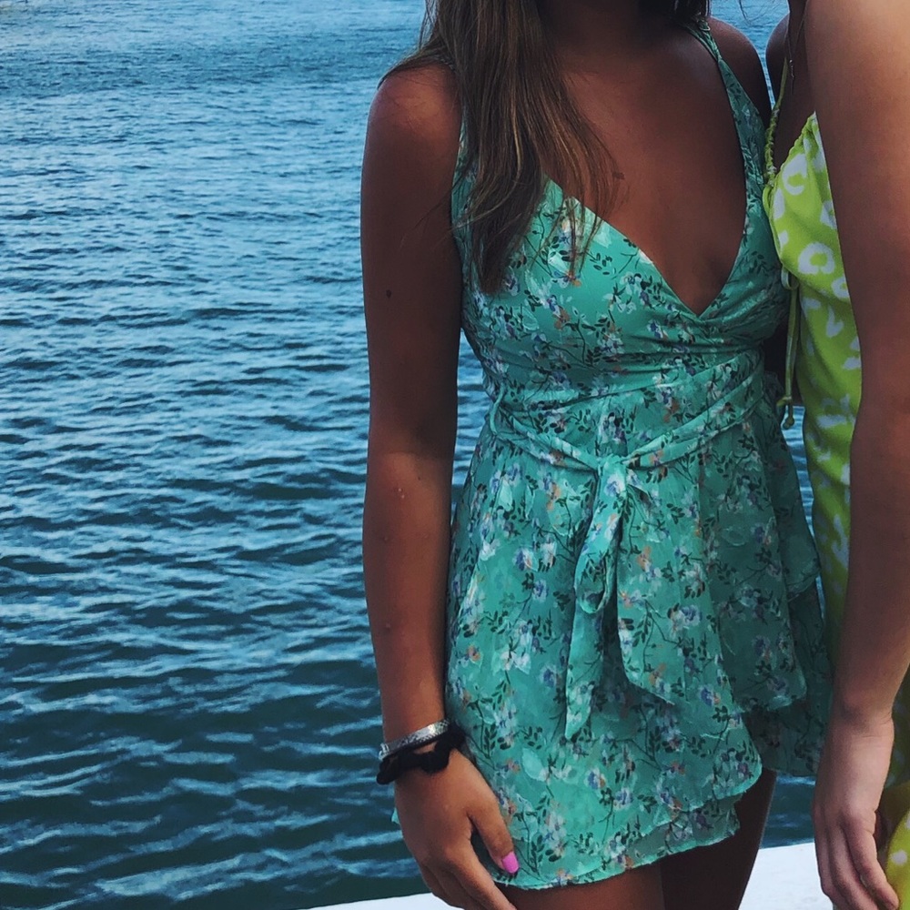 Mint floral strappy back romper